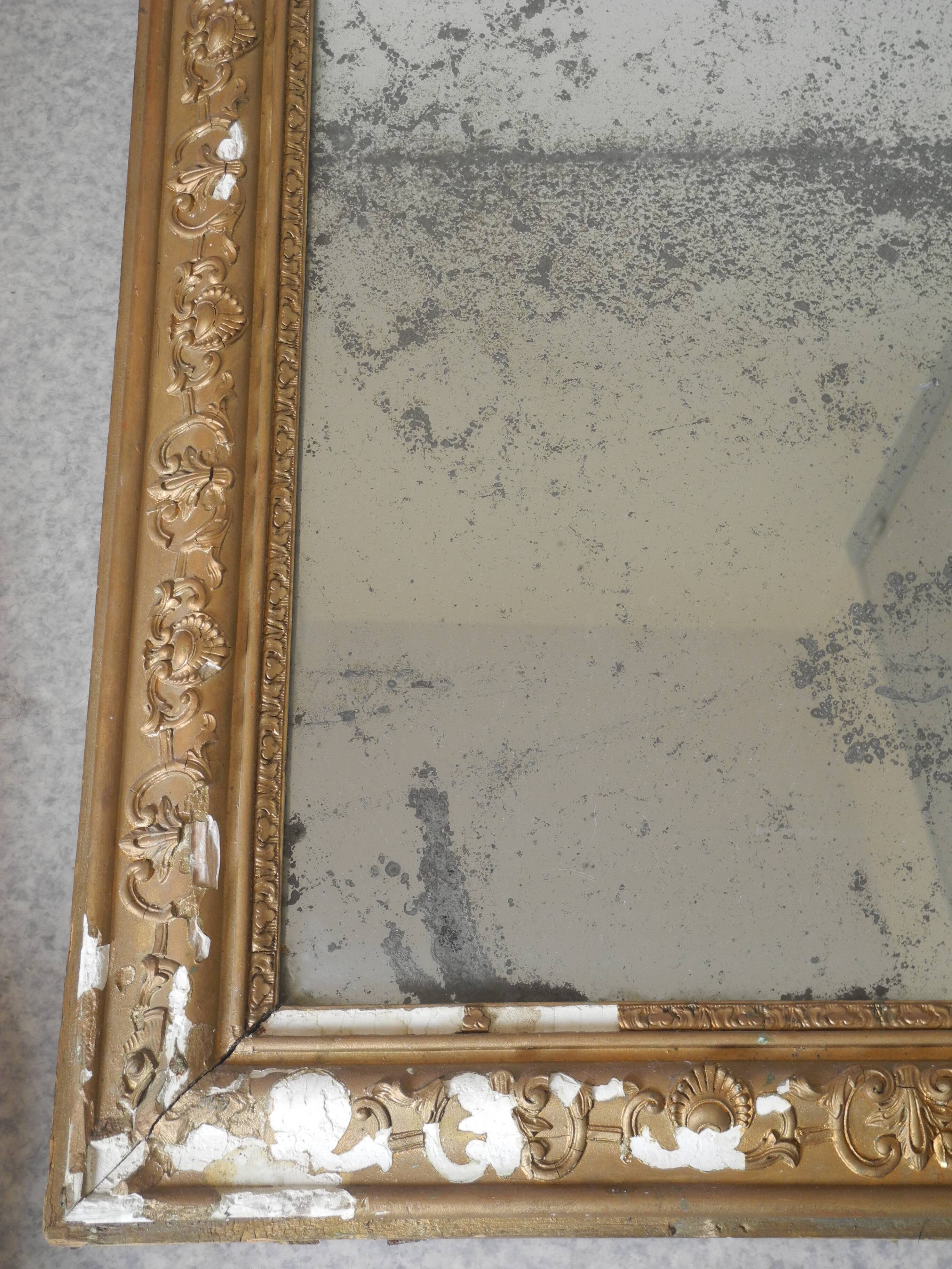 antique mercury mirror with gilded wood and stucco from the 19th century
