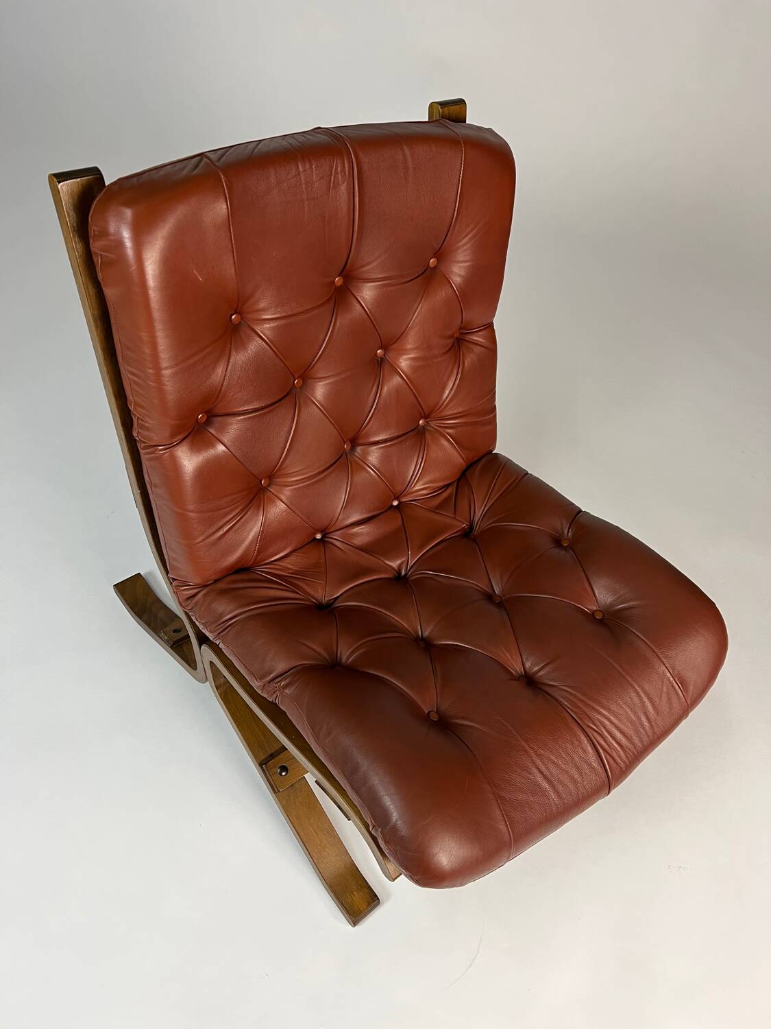Vintage armchair easy chair leather 70s in the style of Ingmar Relling