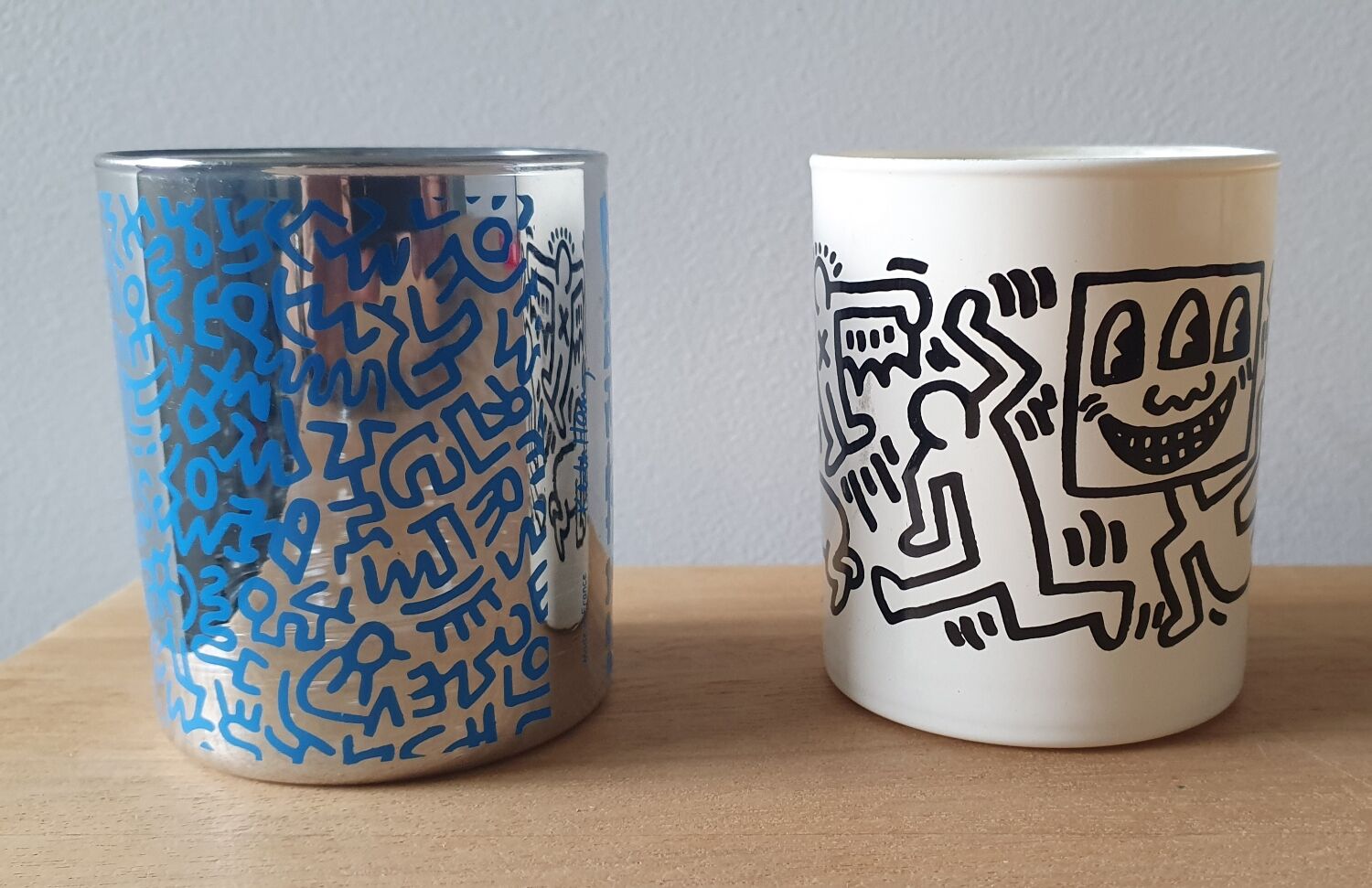 Pair of Keith Haring pots in opaline.