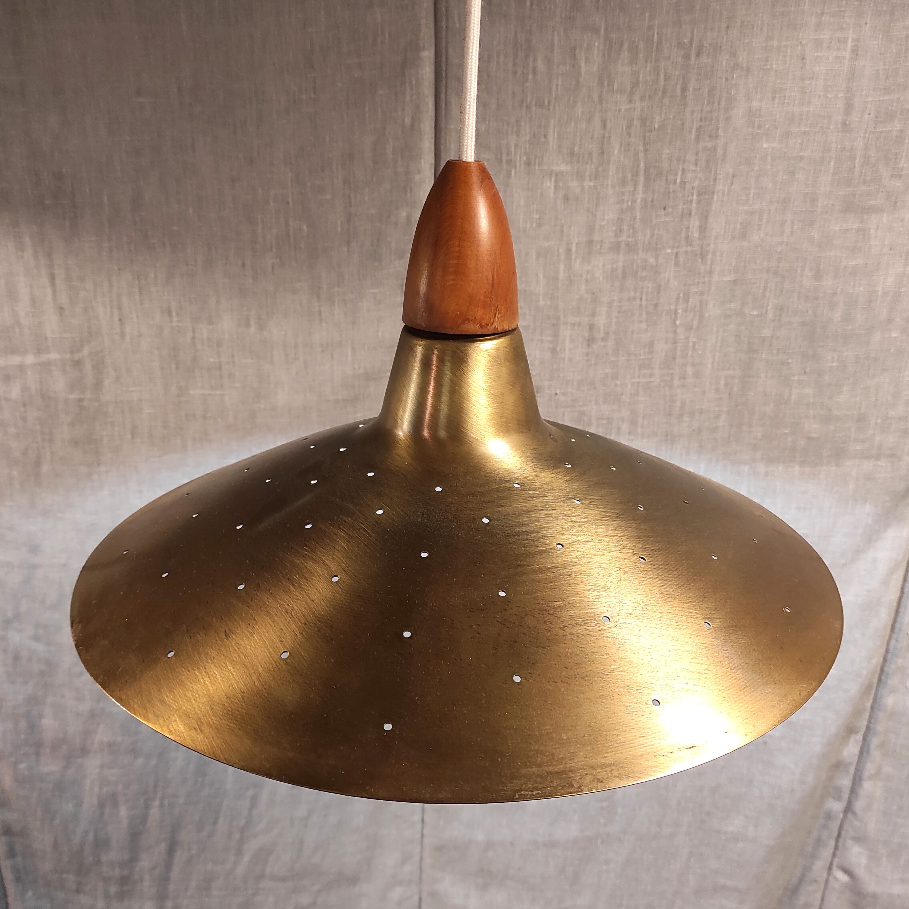 Brass and teak suspension