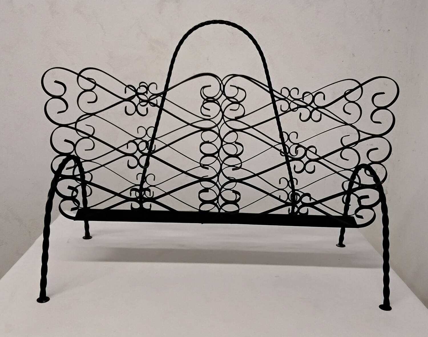 Wrought iron magazine rack signed CHATY Vallauris