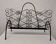 Wrought iron magazine rack signed CHATY Vallauris