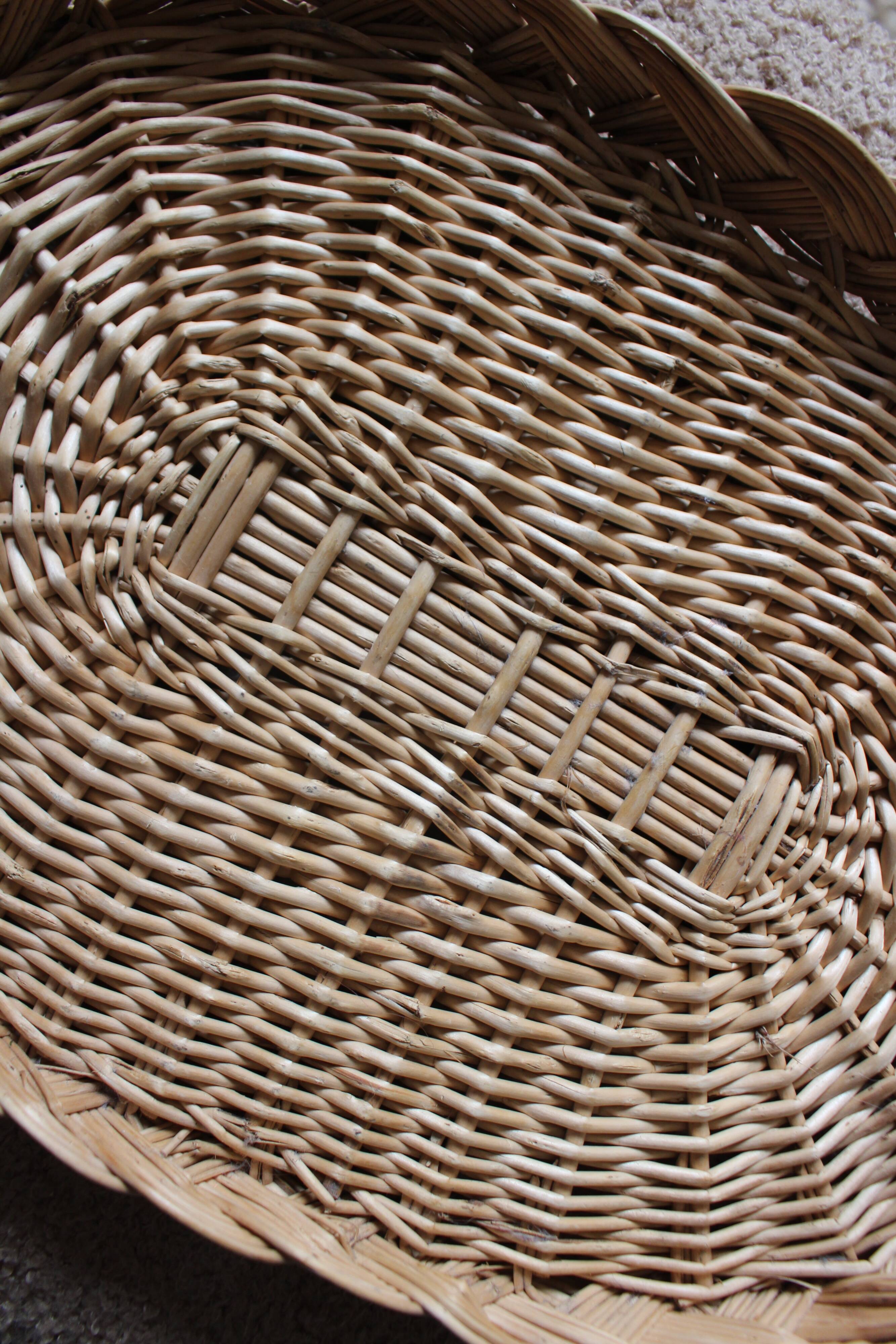 Oval wicker tray with two vintage handles