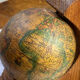 Pair of wooden bookends, rotating globes