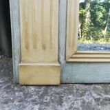 Louis XVI style trumeau mirror in patinated wood