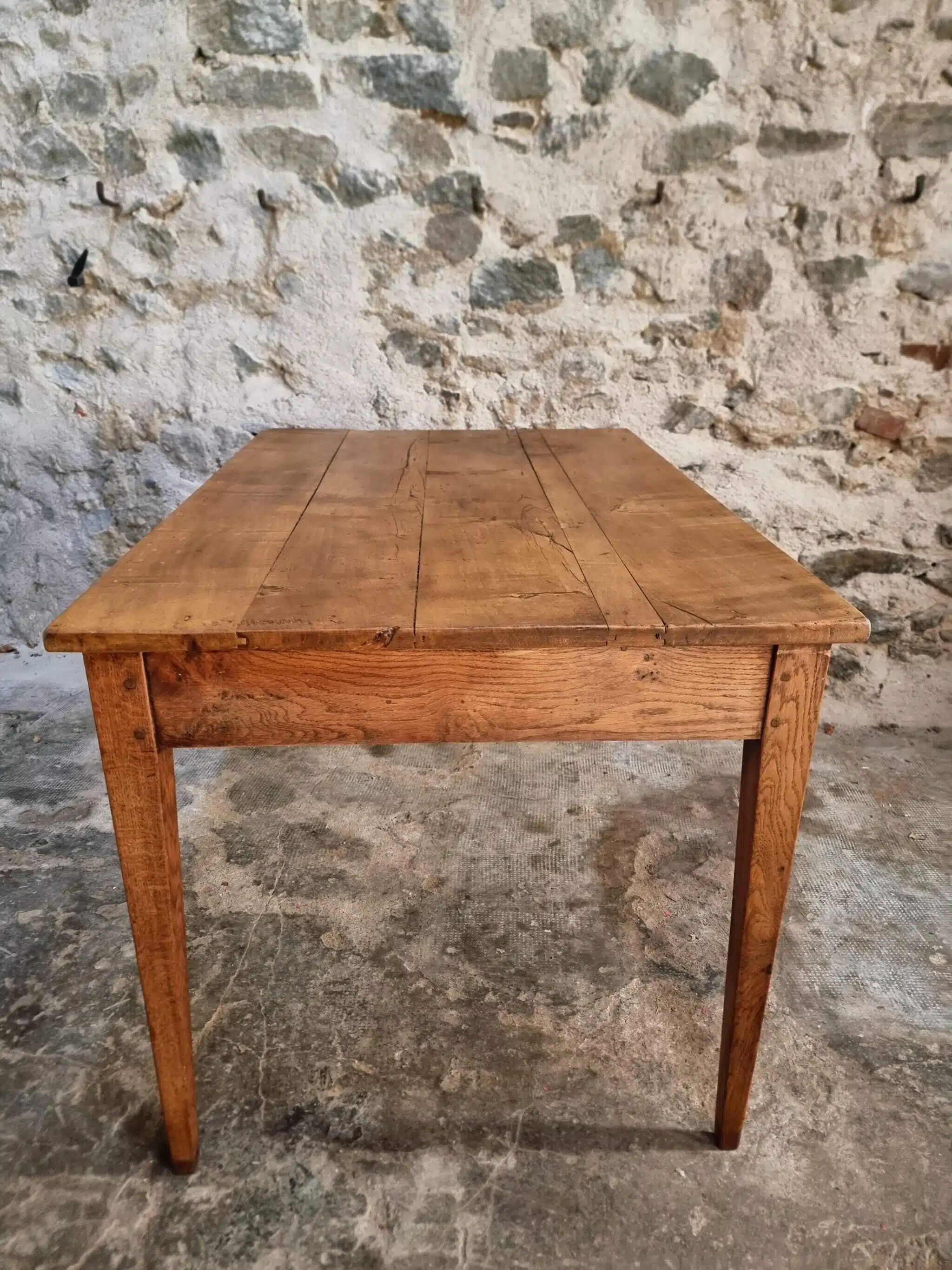 Antique French dining table with drawer, around 1900.