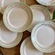 Set of 12 white, mint and gold flat plates, Mosèle de Lunéville