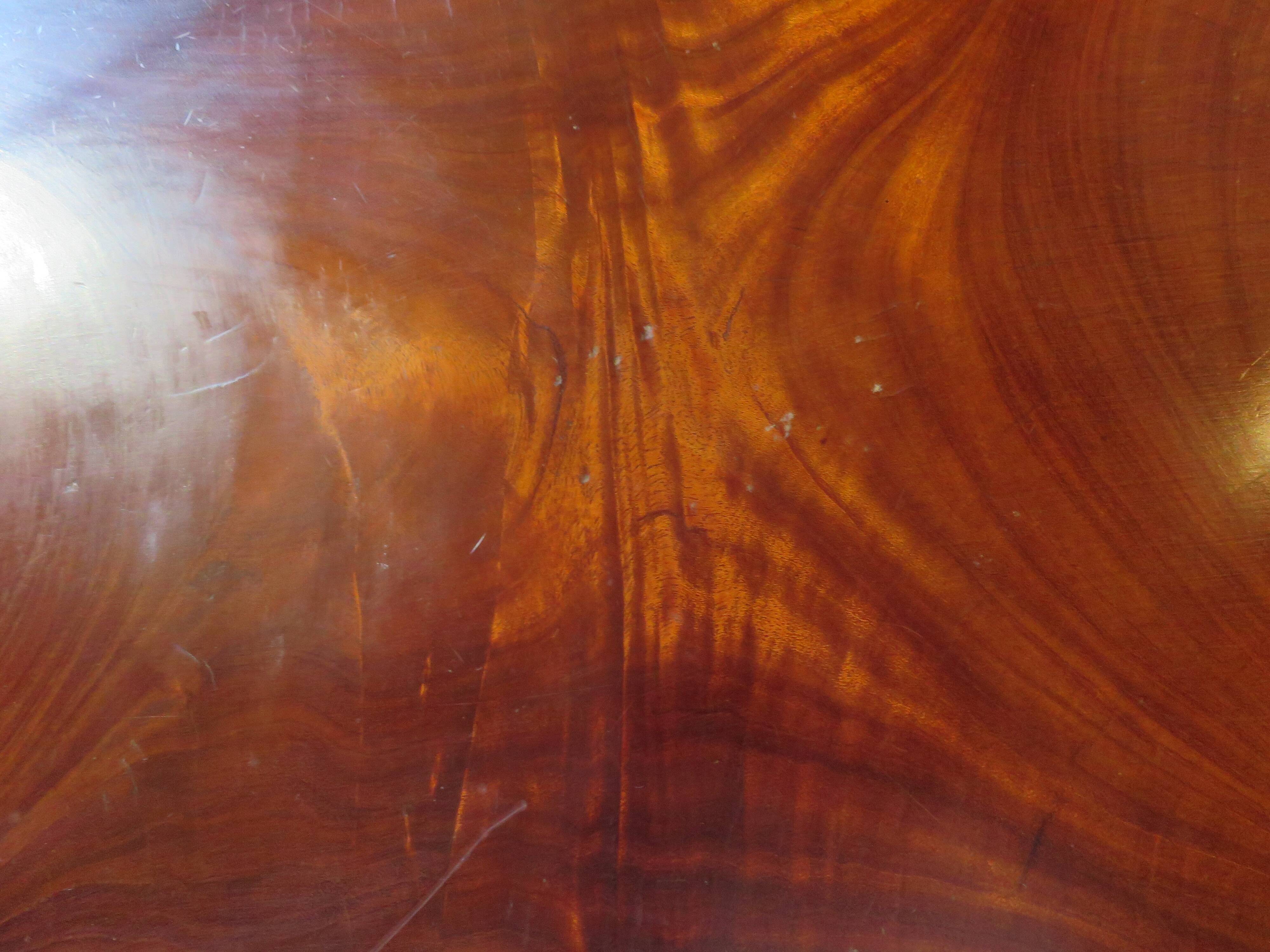 Tripod coffee table - solid okoumé wood - organic shape - brutalist style