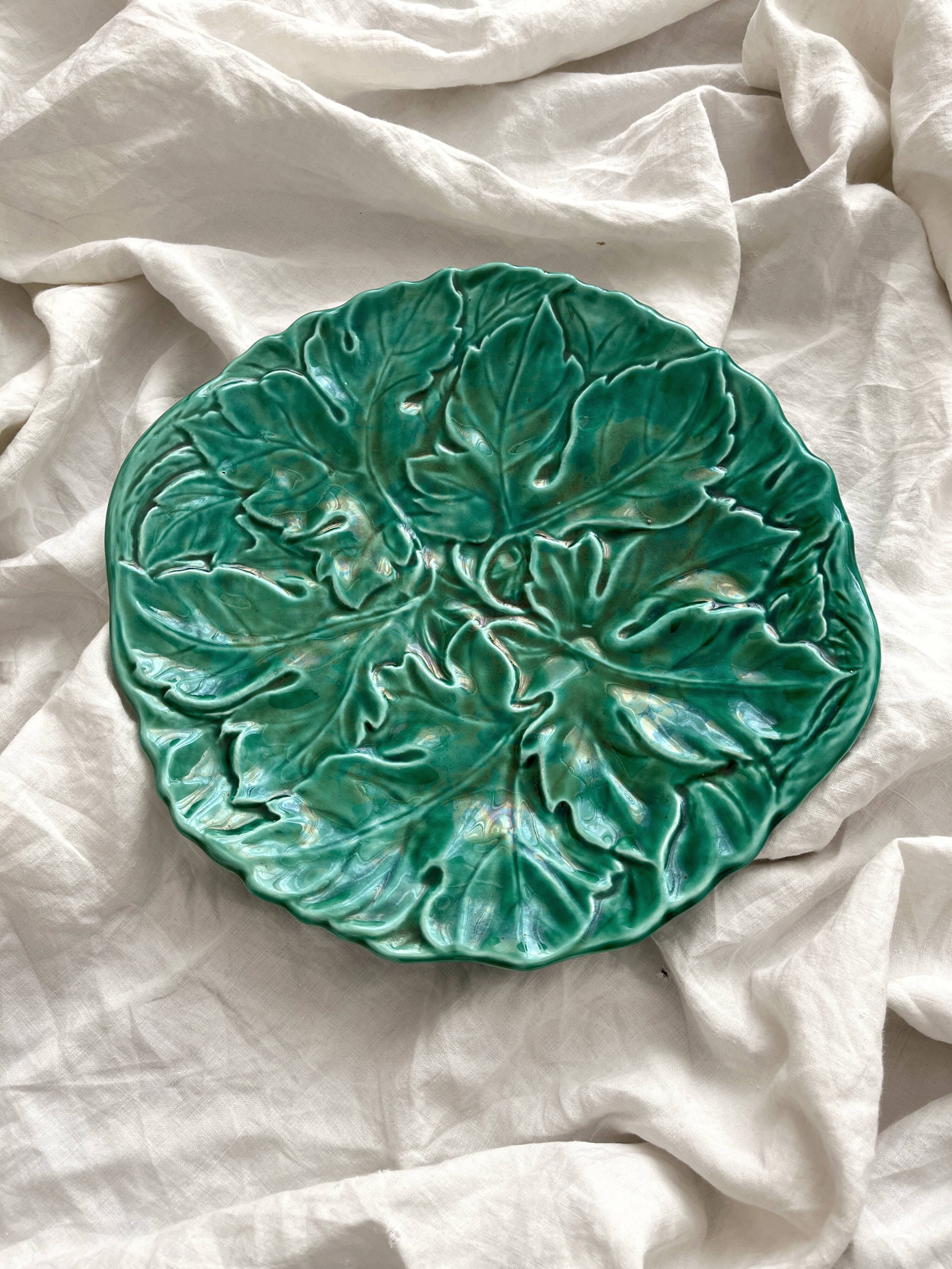 Round barbotine dish decorated with green leaves, Digoin vintage