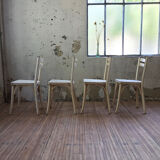 Set 4 white Baumann chairs