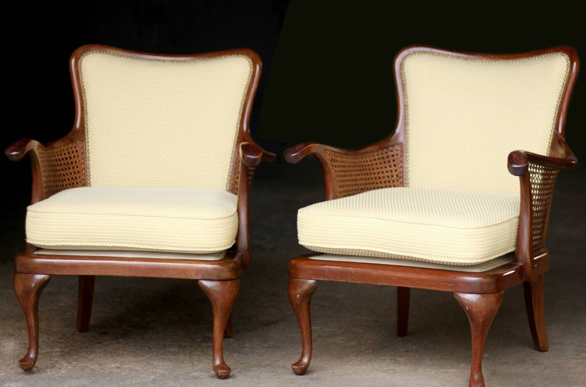 pair of mahogany and cane armchairs. English work (1960s).
