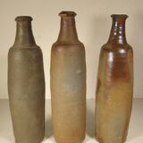Lot de trois bouteilles anciennes en gres normand