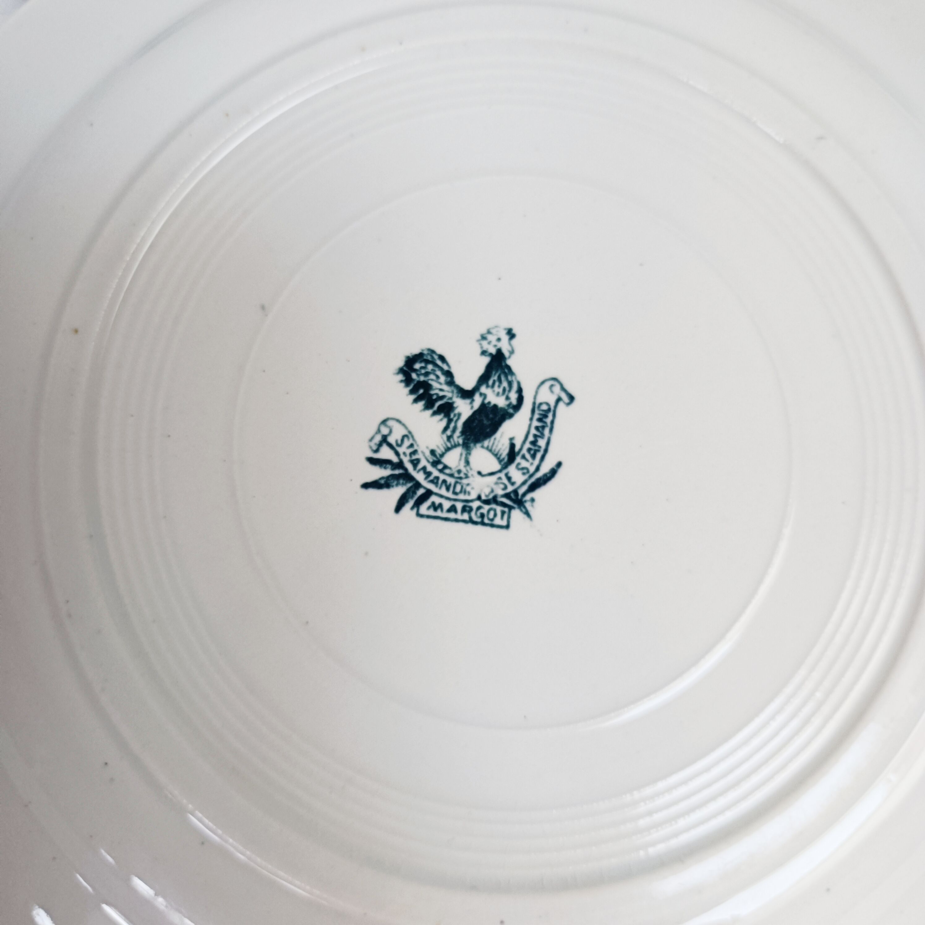 Set of 4 flat plates, iron earth, Société Amandinoise, Margot