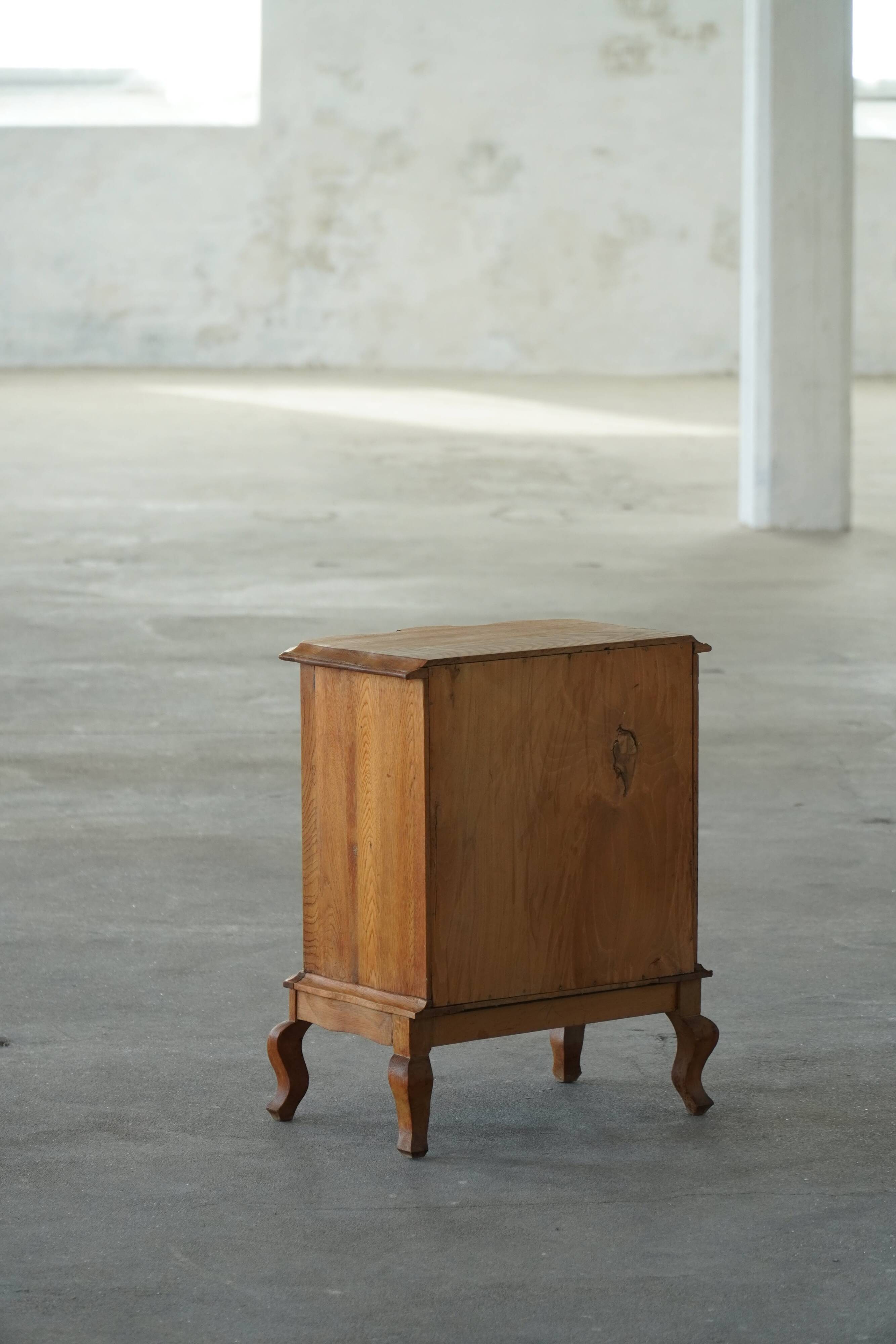 Danish neo-baroque oak commode with three drawers, featuring brass fittings, 1940s.