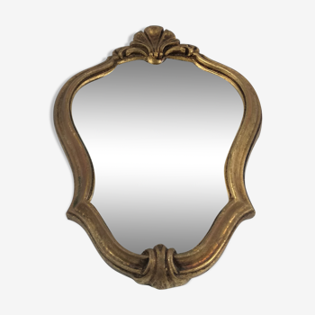 Old mirror in golden resin