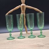 Set of 4 green Luminarc flutes