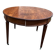 Large oval Louis XVI period table in mahogany.