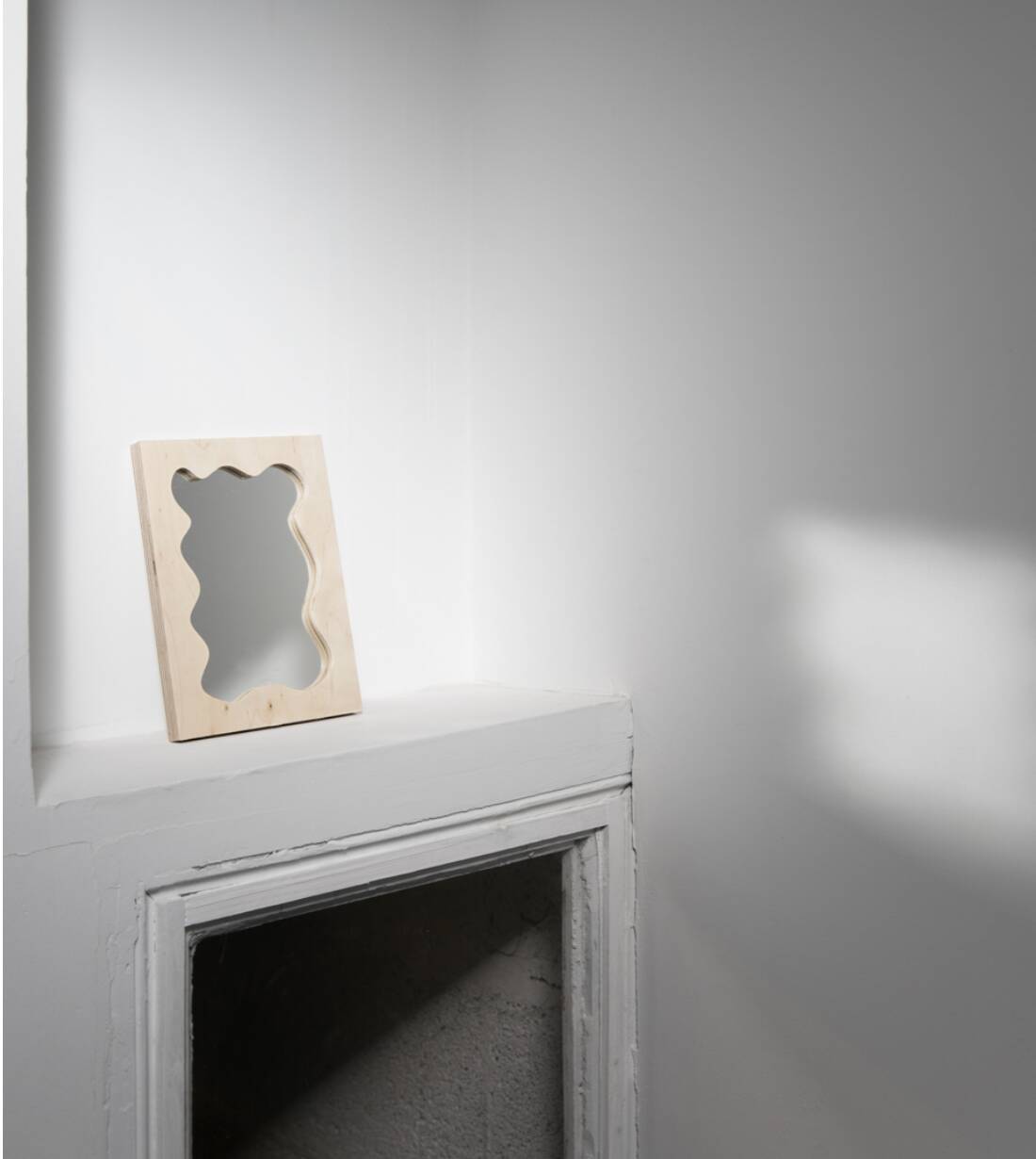 Mini splash asymmetrical mirror