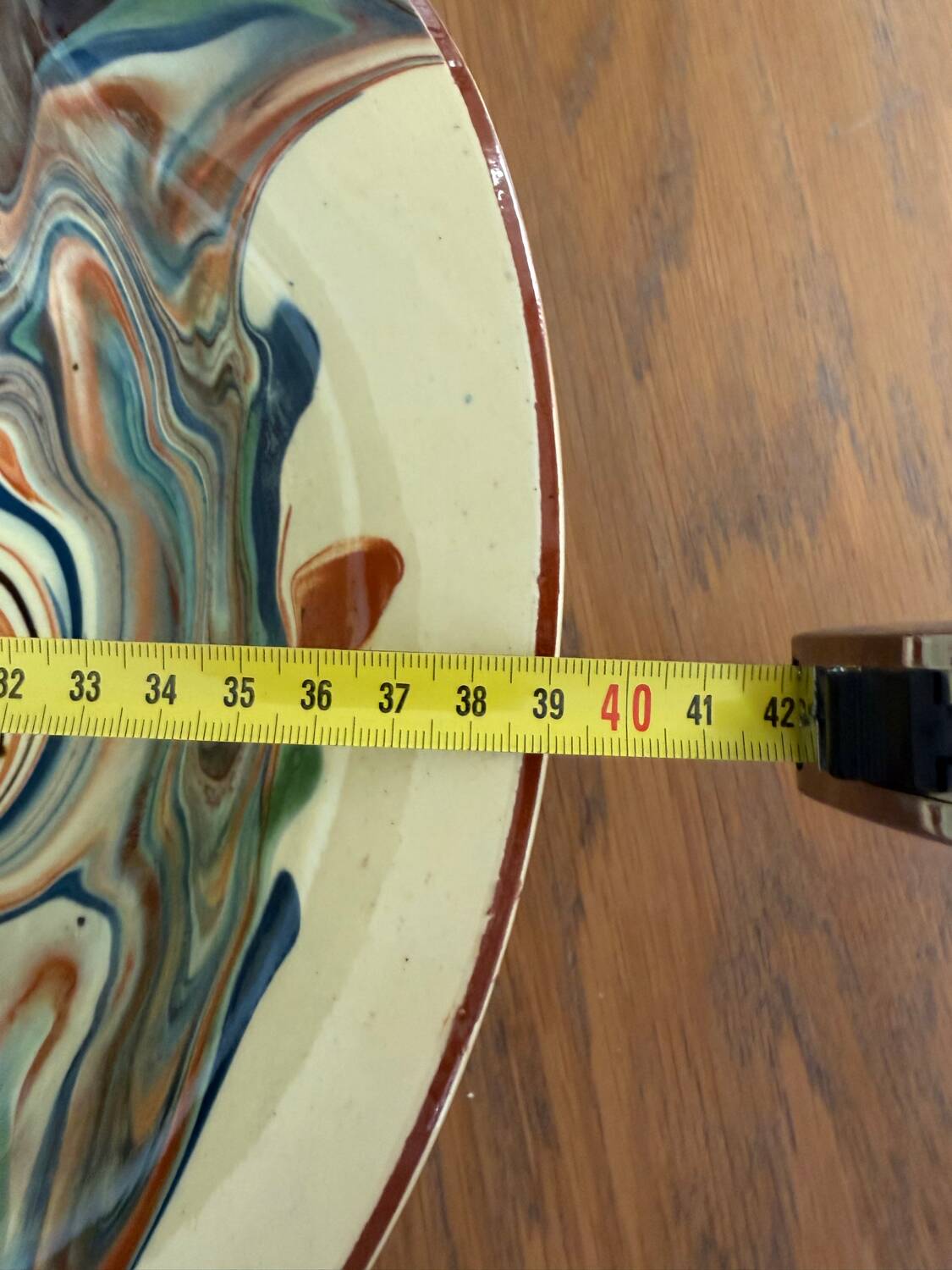 Glazed ceramic plate signed