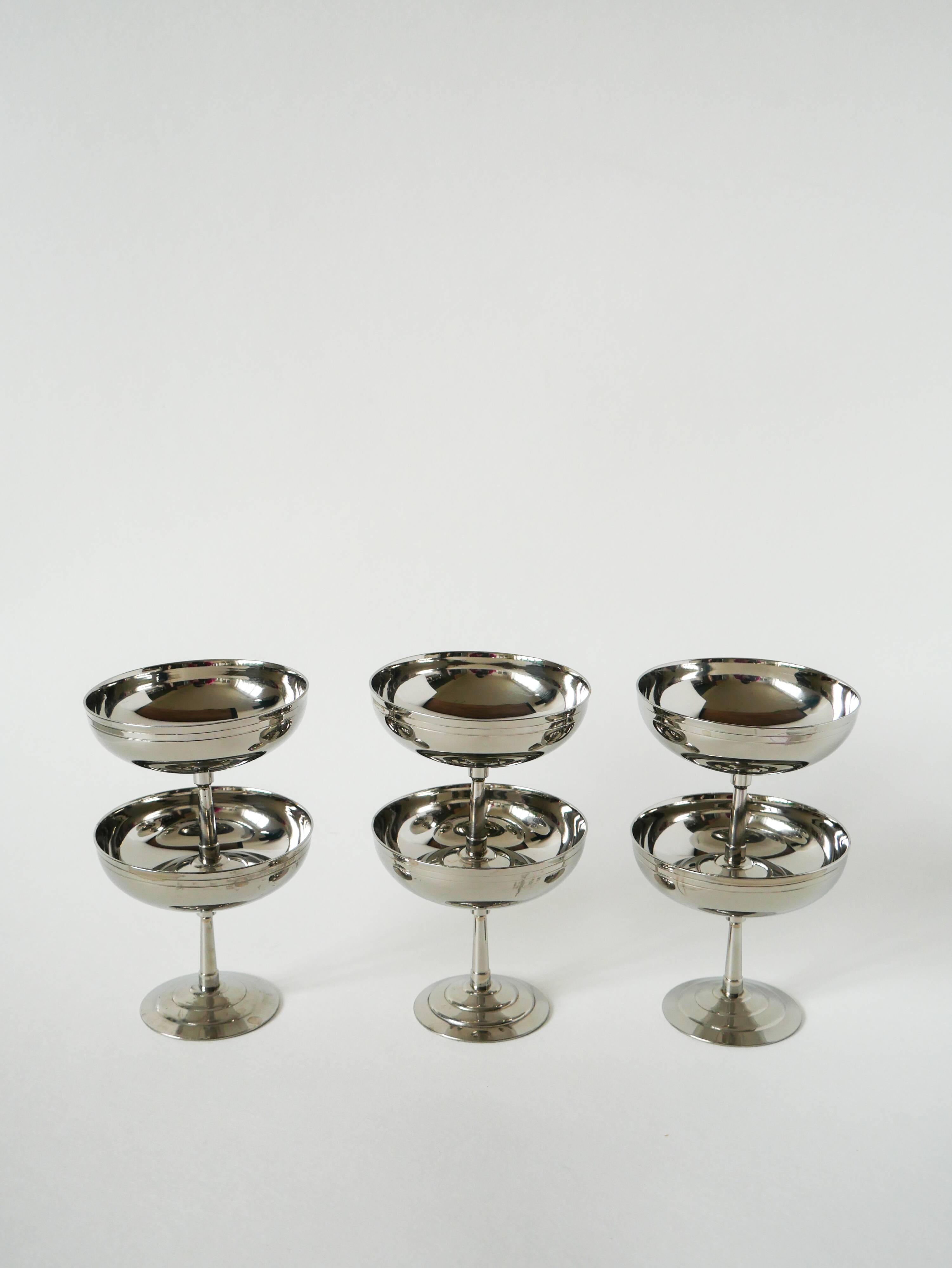 Set of 6 stainless steel bowls with fine feet, Design, 1970