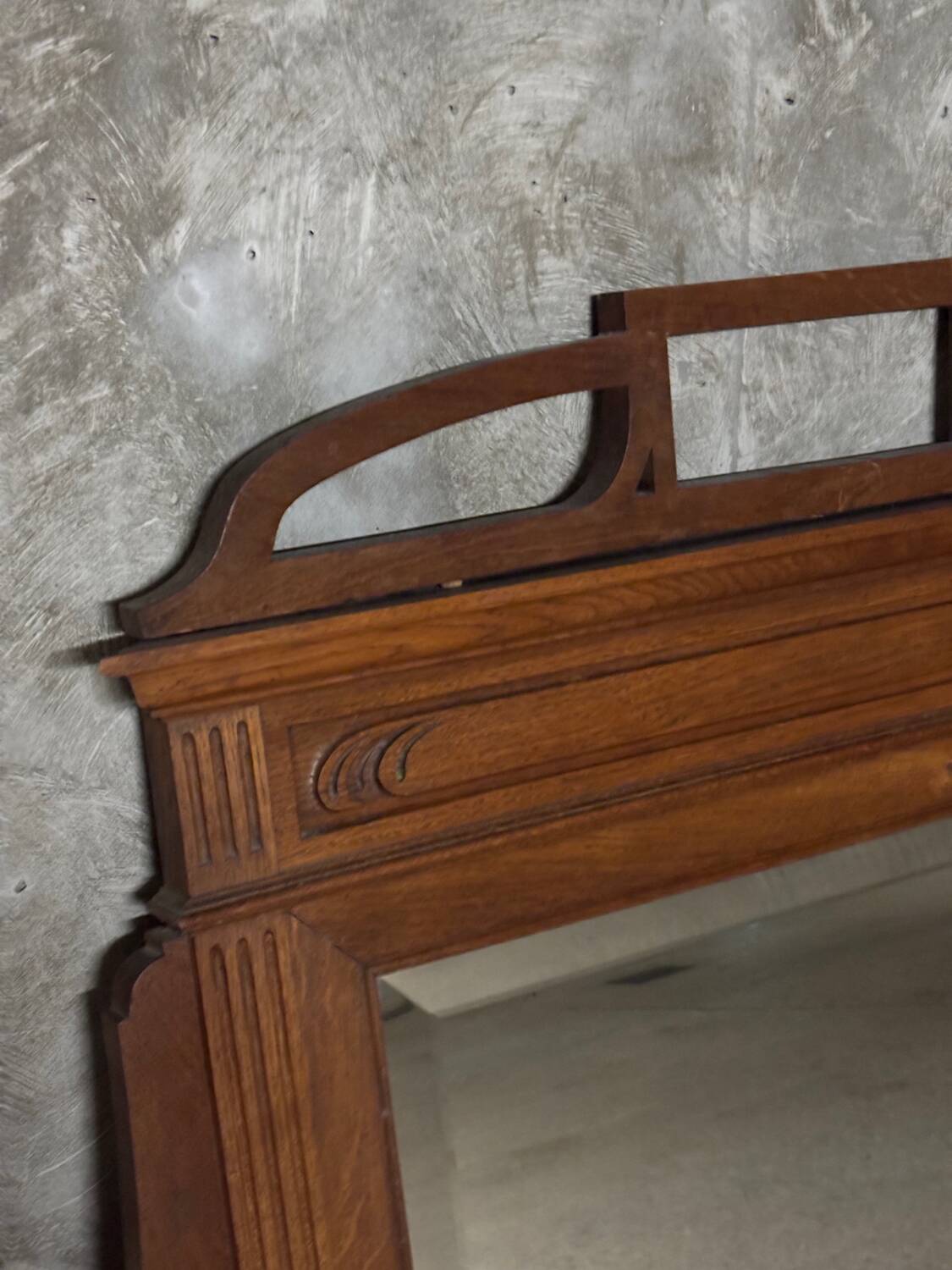 Molded and carved wooden trumeau