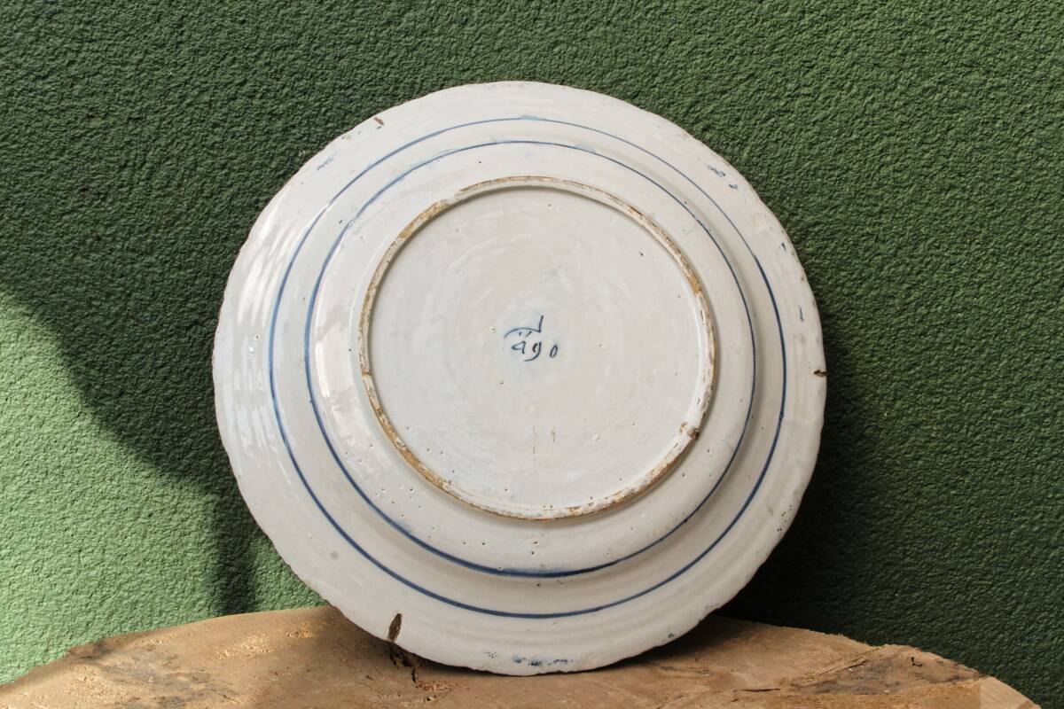 Delft earthenware dish, signed the porcelain label