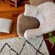 Renovated crapaud armchair with footrest - Boucle fabric