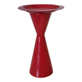 Vintage design candlestick in red metal in the shape of an hourglass