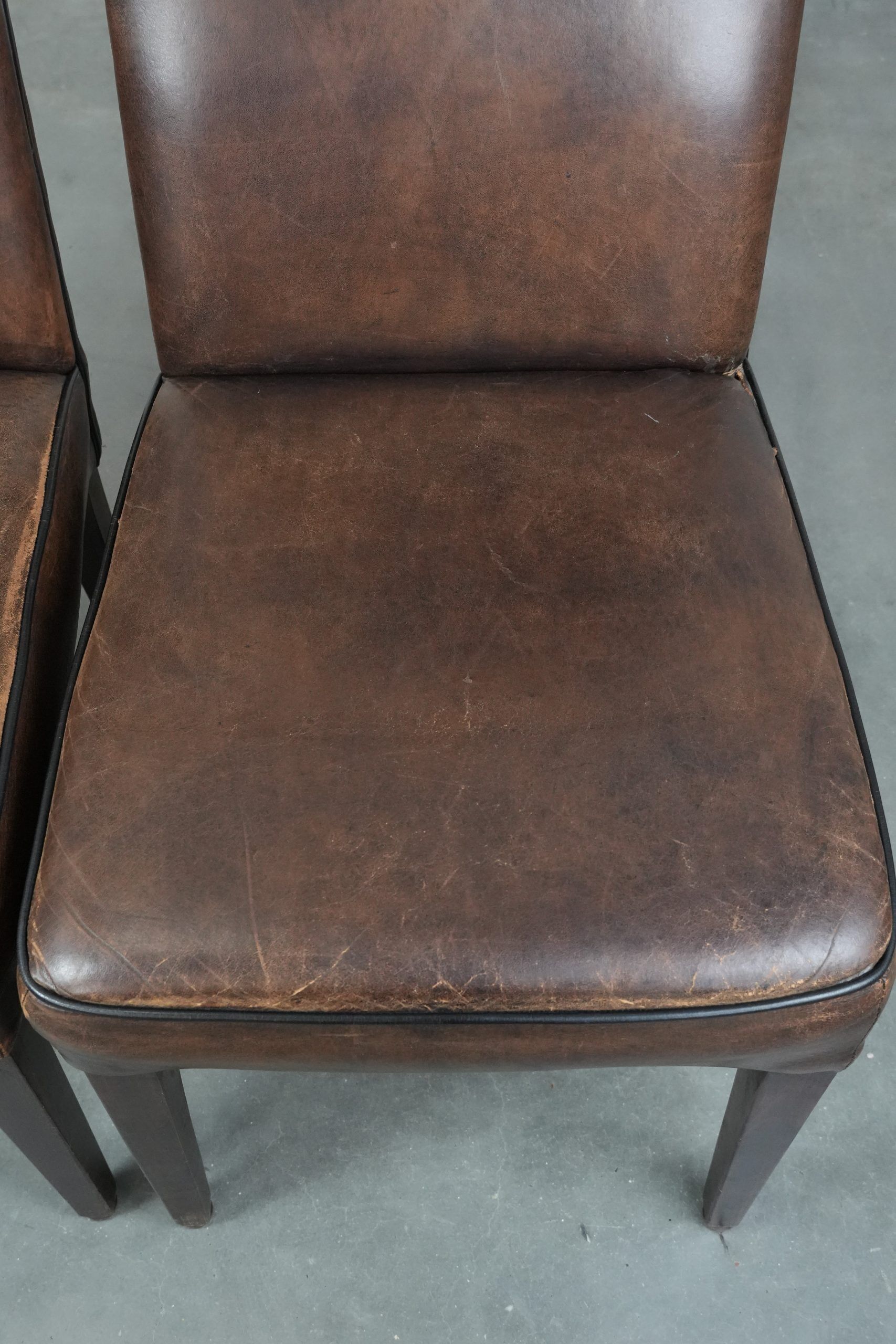 Great set of 8 stylish vintage sheepskin dining chairs with character