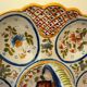 Dish, egg server in hand-painted earthenware, signed Geo Martel