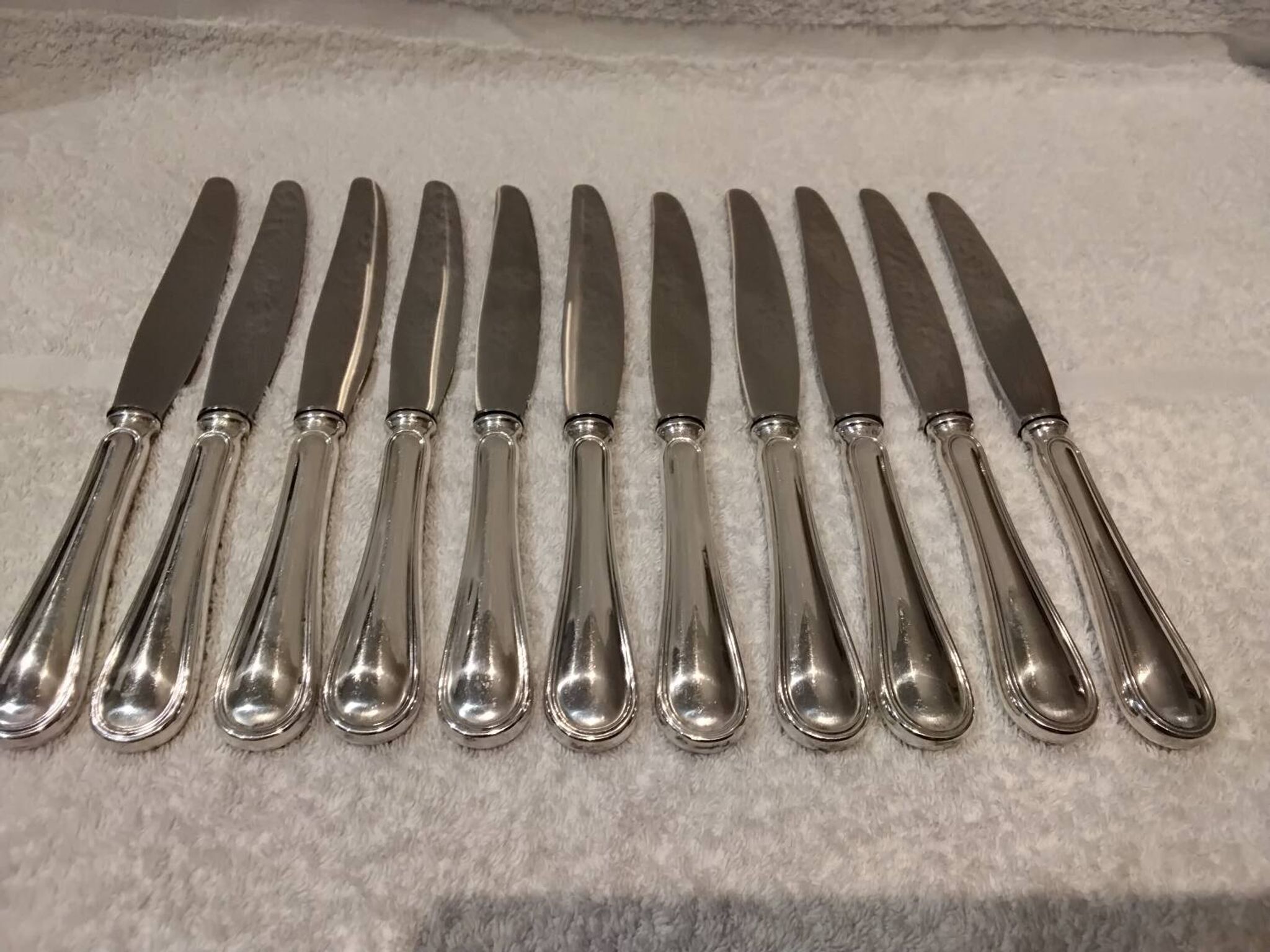 11 table knives with 800 silver handles, Swiss goldsmith Jezler filet