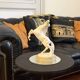 White rearing horse statuette