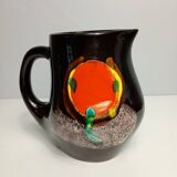 Brown ceramic pitcher with coloured patterns signed Bresse.