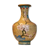 Asian vase decorated with cherry trees