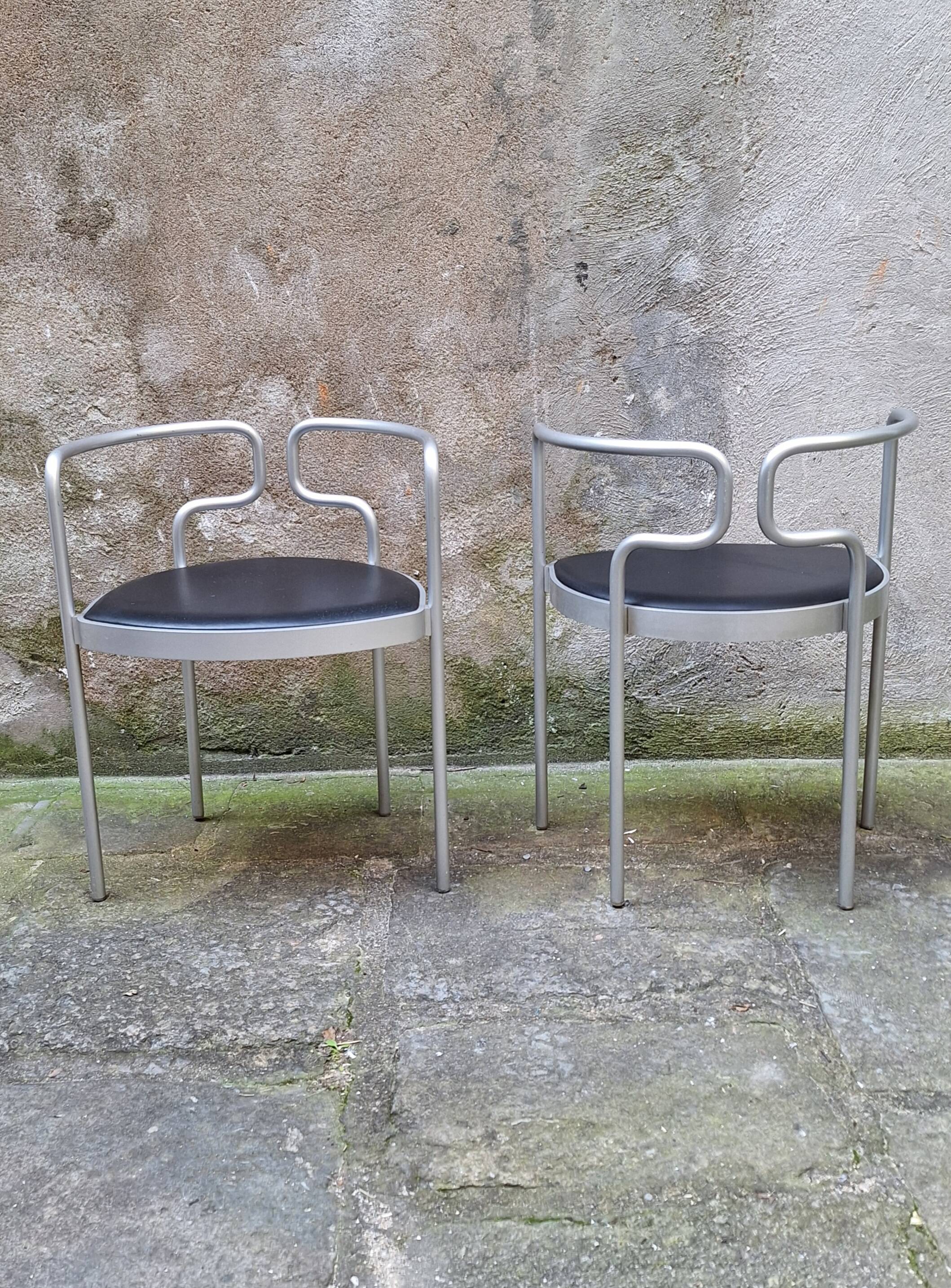 Pair of aluminum armchairs by Henning Larsen