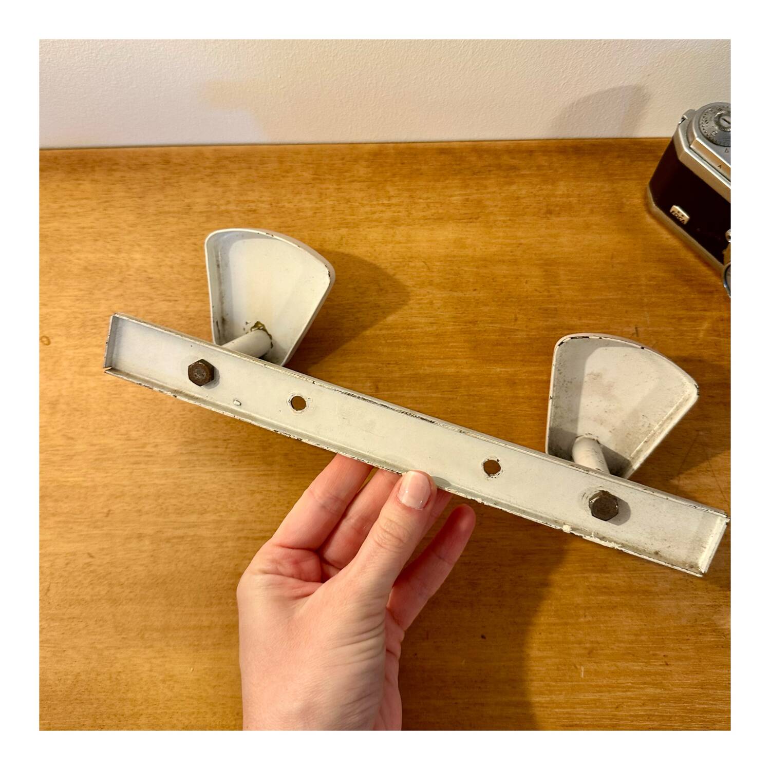 White metal coat hook