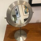 Tilting table mirror