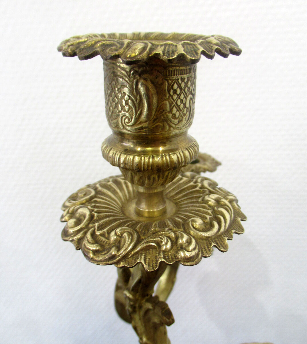Pair of bronze candelabras and brass bobèches
