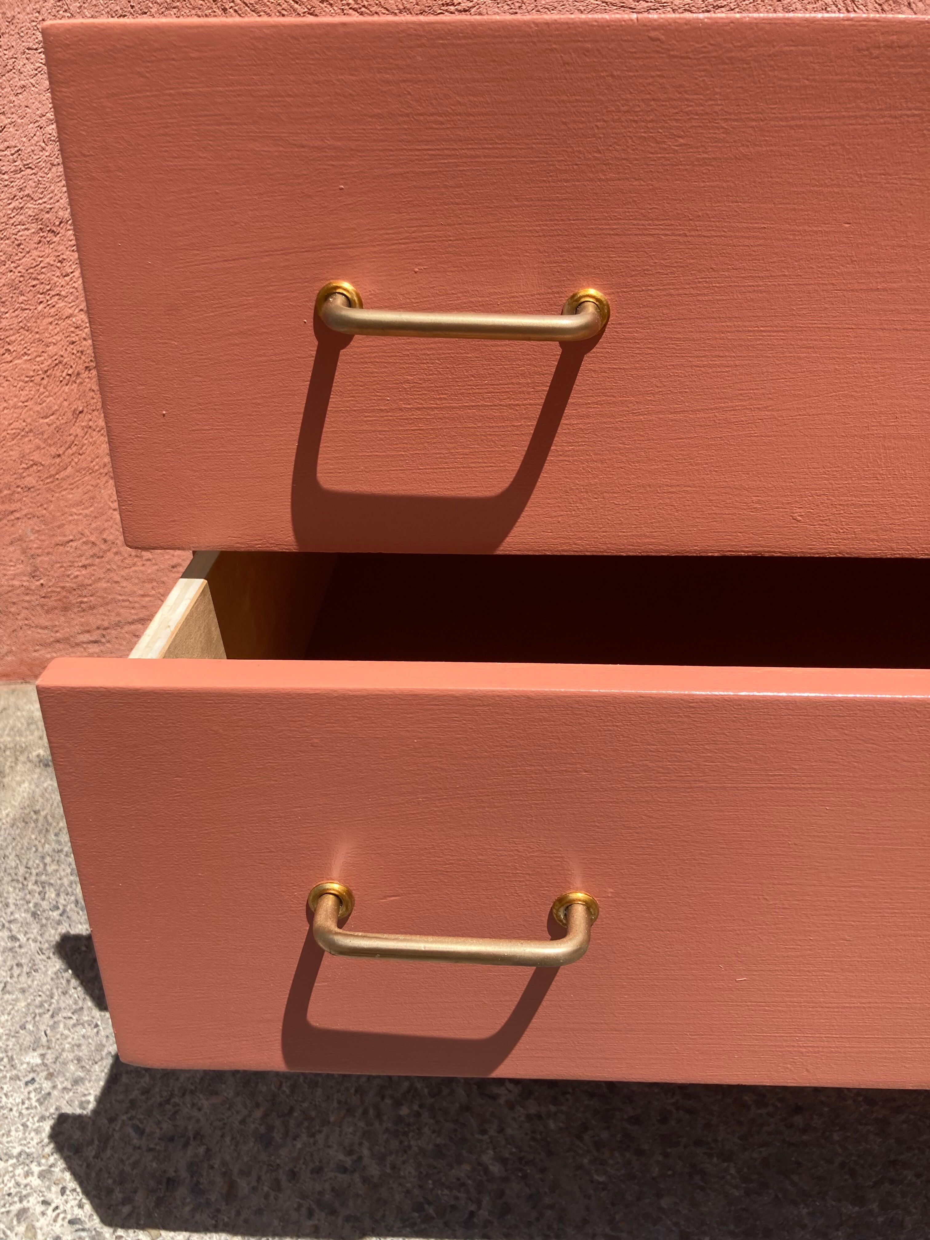 Vintage terracotta bass chest of drawers