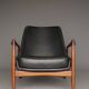 Seal armchair in leather and teak by Ib Kofod-Larsen for OPE, Sweden, 1960s.