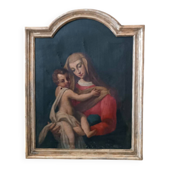 Old oil painting on canvas "Virgin Mary with Child"