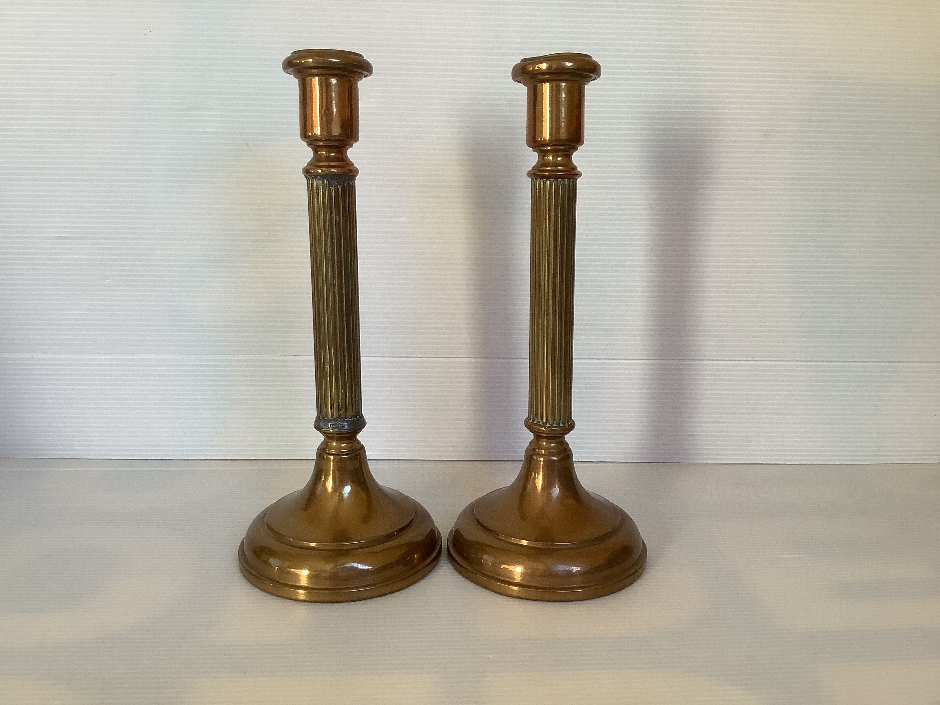 Pair of old brass candle holders