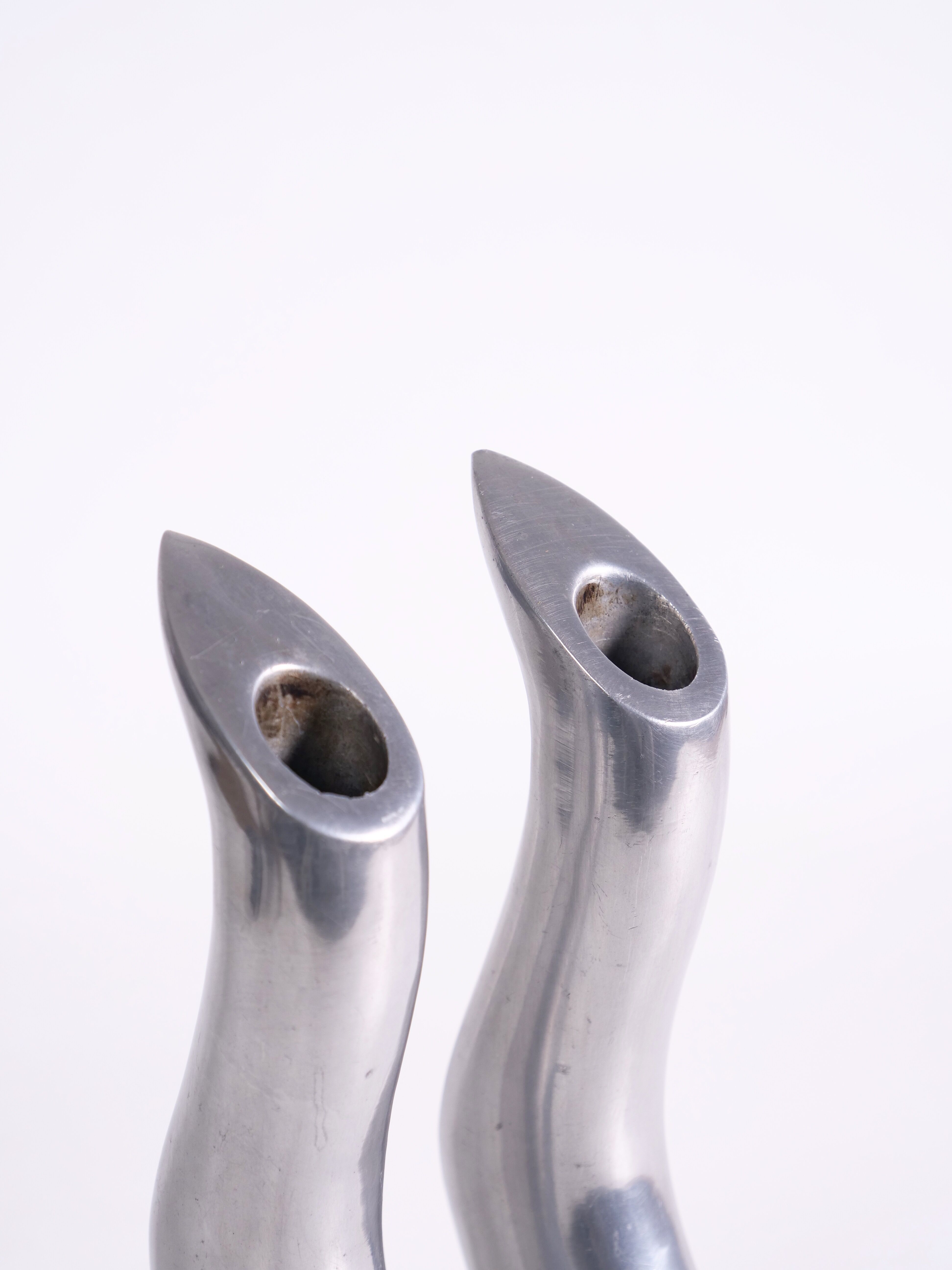 Pair of cast aluminum candle holders by Anna Efverlund
