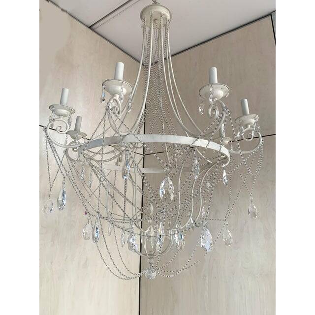 Contemporary ivory florentine iron and crystals chandelier
