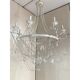Contemporary ivory florentine iron and crystals chandelier