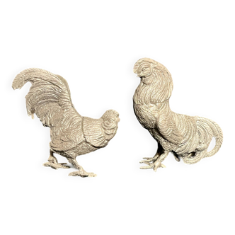 Showcase objects, two 20th century metal rooster and hen subjects