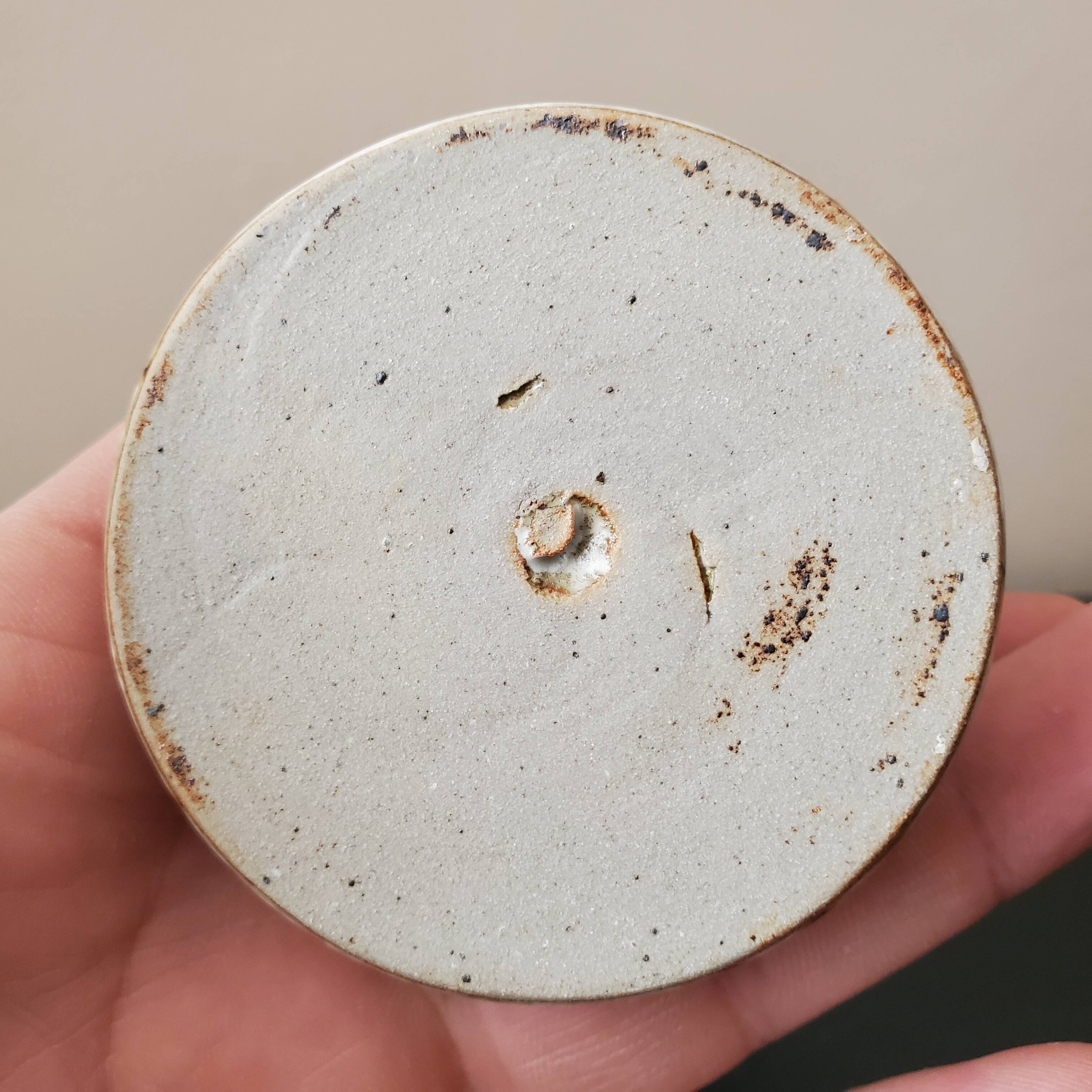 Old glazed sandstone chalice glass