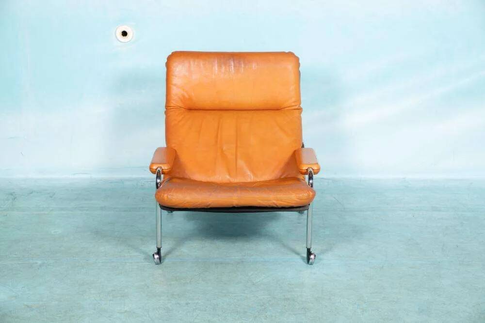 60s cognac leather designer armchair, mid-century modern leather lounge chair.