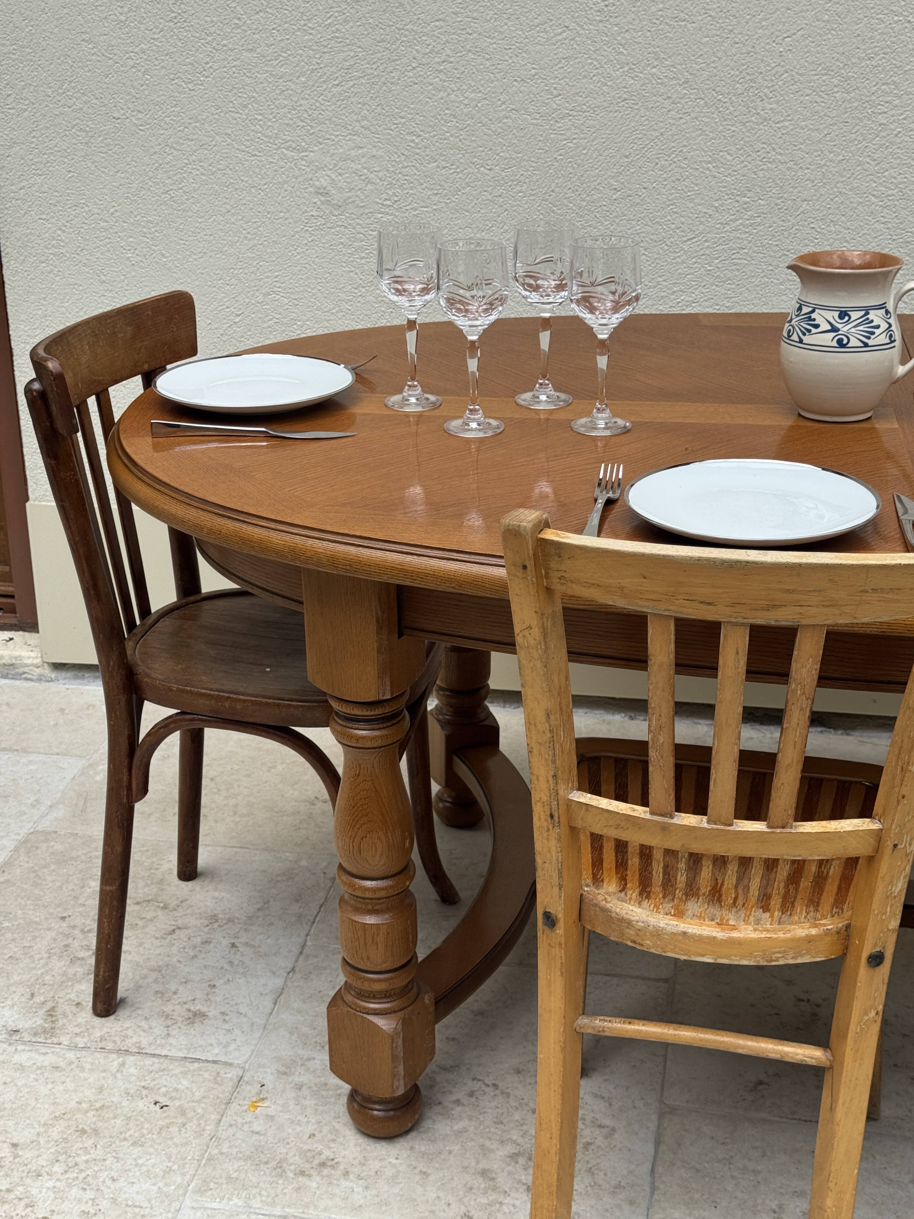 Oak dining table, oval living room table with two extensions.
