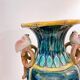 Vase en barbotine émaillée à décor d'oiseaux et bambou